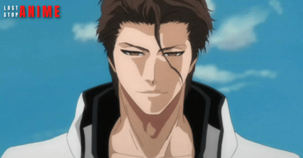 Sosuke Aizen with his hair flicking around his eyes